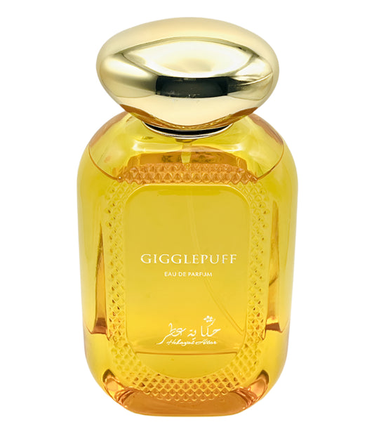 Gold perfume bottle labeled 'Gigglepuff' on a white background